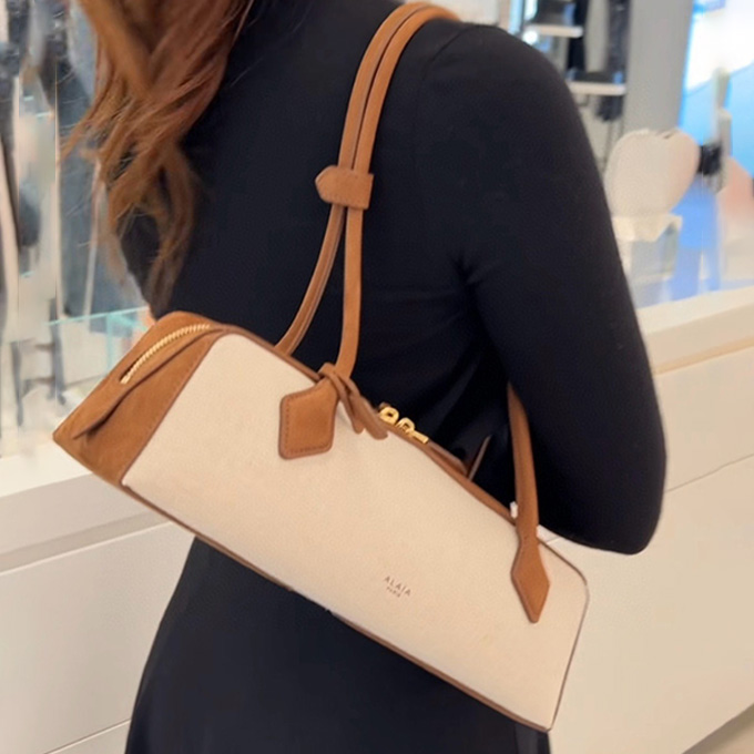 alaia le teckel long‑handle canvas suede shoulder handbag